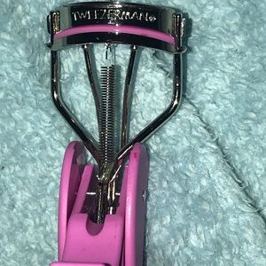 Pink travel size eyelash curler